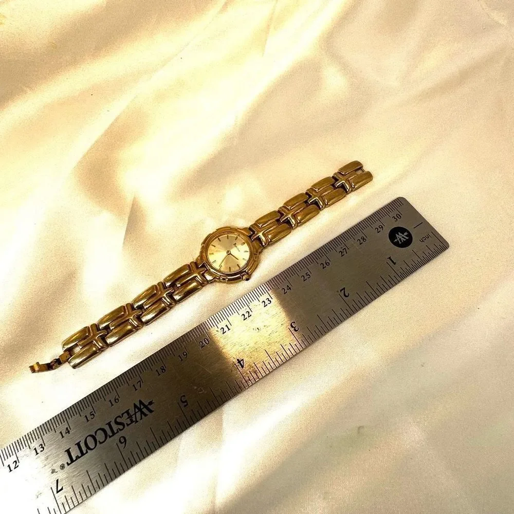 Bulova gold tone vintage chain round face watch